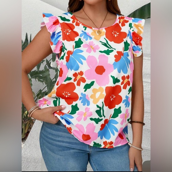 NWT Floral ruffled sleeves blouse. Pit to pit 22 inches. Bust 42.9 inches. 🌸🎉 - Picture 1 of 3